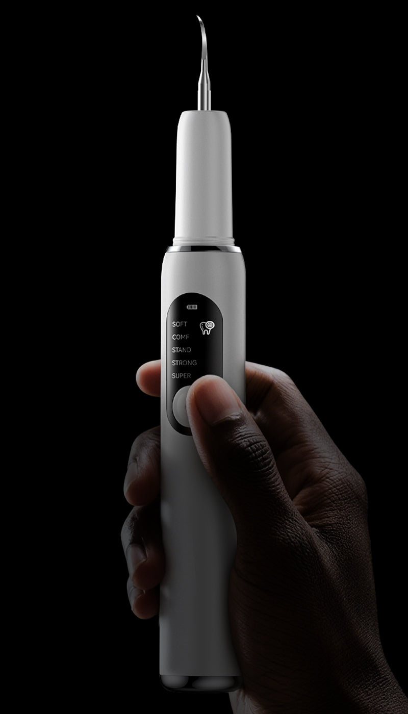 โPortable ultrasonic dental scaler with stainless steel tip and control panel showing Soft, Comfort, Normal, and Strong cleaning modes.โ