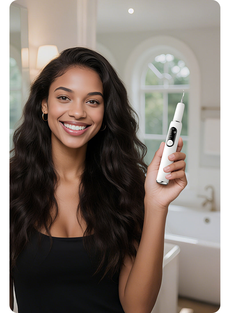 A smiling woman holds an ultrasonic teeth cleaner in a modern bathroom, reflecting healthy, confident living through advanced oral care technology.