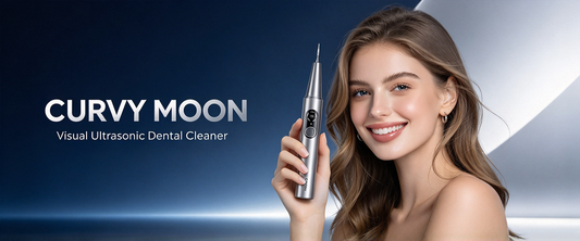 Woman smiling while holding a Curvy Moon handheld ultrasonic dental cleaner against a dark blue background