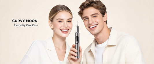 A smiling woman and man presenting a silver Curvy Moon handheld tooth cleaner beside “Everyday Oral Care” text.