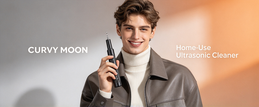 Smiling man in a brown jacket holding a black Curvymoon handheld tooth cleaner.