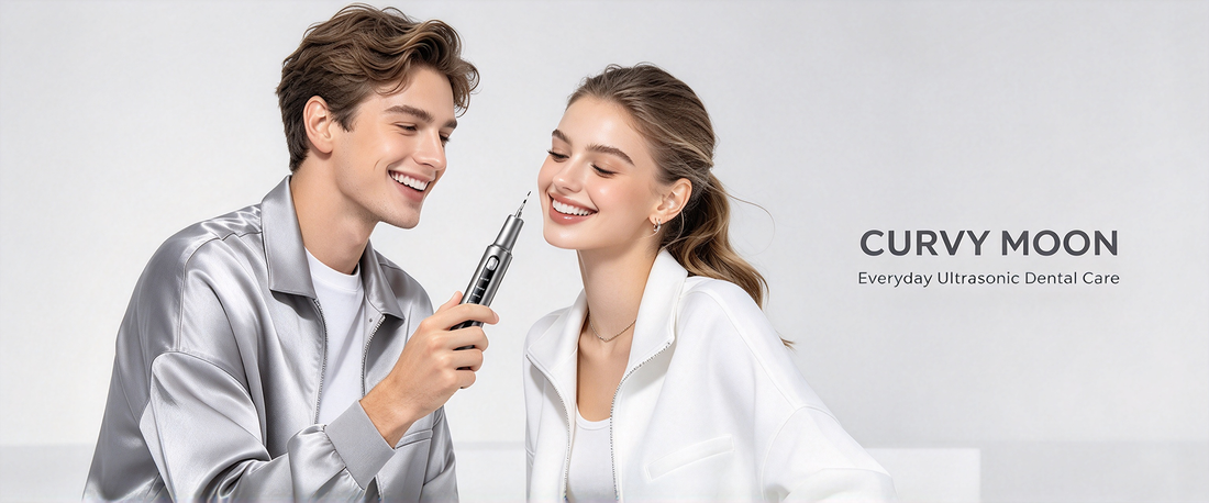 A smiling man holding a Curvymoon handheld dental cleaner beside a smiling woman.