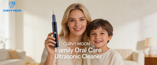 Handheld ultrasonic dental scaler removing tartar from teeth at home